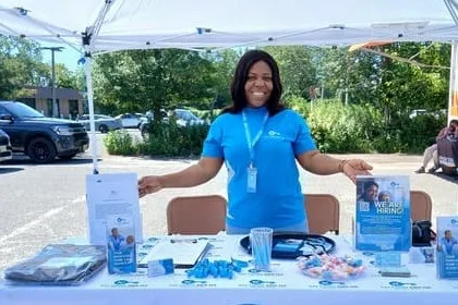 Peace Tsaku, MSW, founder of Key Family Care, at a community event